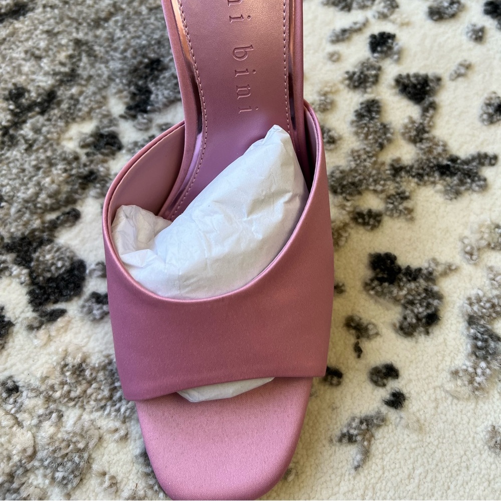 Brand new pink satin mules. 3 1/2 inches. Super cute